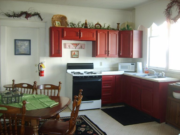 The Caring Center Transitional House for Starter Families Looking For Shelter. Interior View of the House, Kitchen and Dining Table and Chairs.